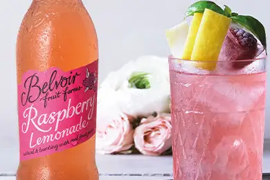 Chilled Belvoir raspberry lemonade, served in a glass.