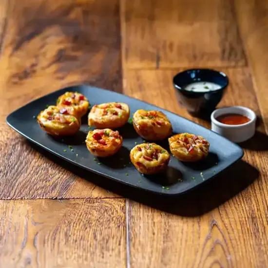 Mini Filled Cheese & Bacon Skins (030312p1)